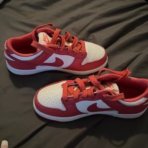Girls size size 13 low pink and white Nike dunks